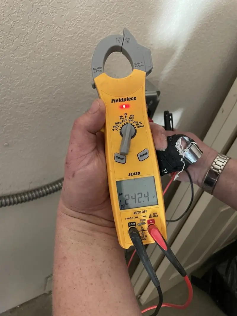 Voltage testing with clamp meter during Generator Installation in Glenvar Heights